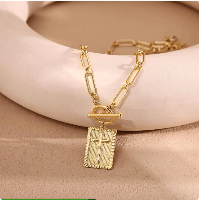Delicate nail cross necklace