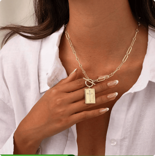 Delicate nail cross necklace