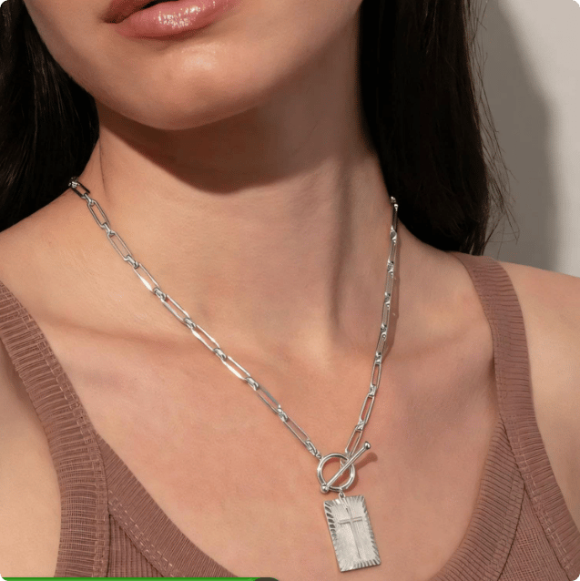 Delicate nail cross necklace