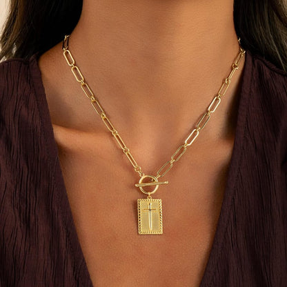 Delicate nail cross necklace