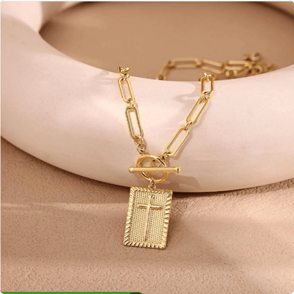 Delicate nail cross necklace